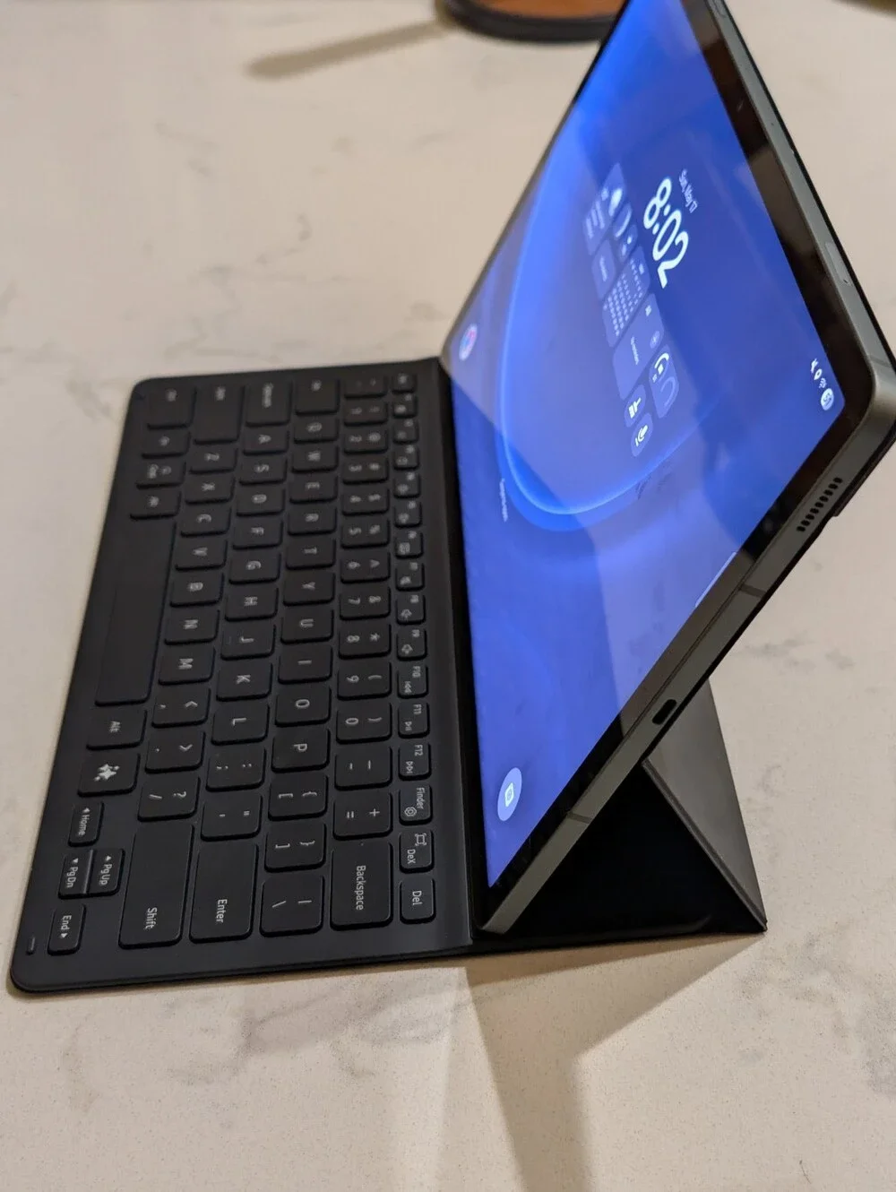 Samsung Galaxy Tab S9 FE+ in Silver, with Black Samsung Keyboard Case